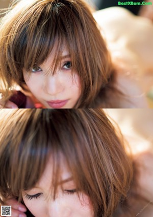 A naked woman sitting on a tatami mat in a room.